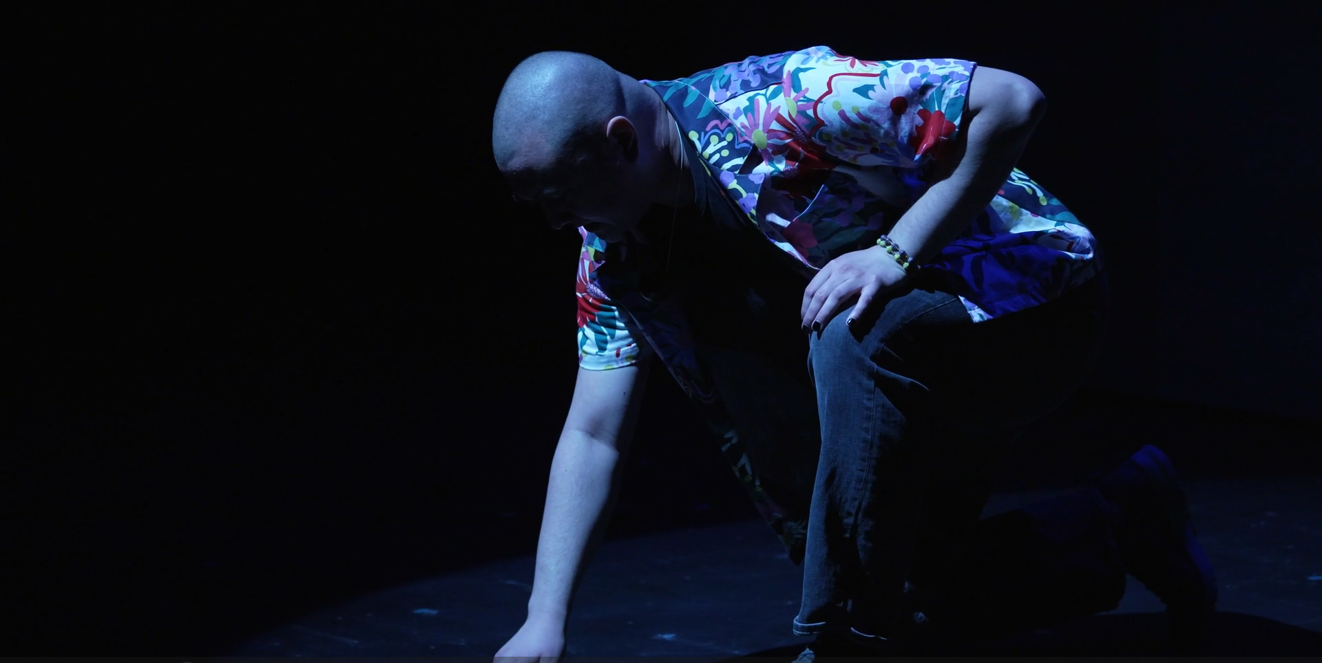 The culmination of the theatrical ritual that lay beneath the surface of the story-telling and lecture sections- reconciling a clown’s fears with their love of the stage. Accepting dust, embracing darkness in The Shadow and the Fool. Screenshot taken from archival video shot by Katie Cutting.